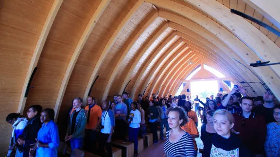 The first morning devotion at the Youth Pre-Assembly in a chapel near Heja Game Lodge. Photo: LWF/JC Valeriano