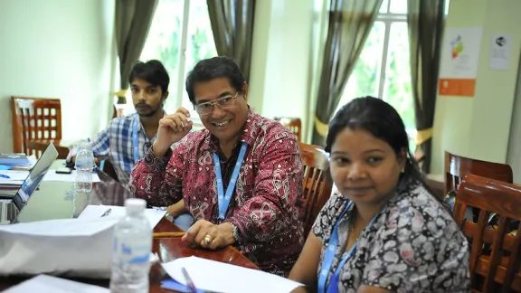 Delegates enjoy a relaxed moment during the LWF Asia Pre-Assembly, Bangkok, Thailand, 2016. Photo: LWF/Arni Danielsson