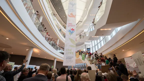 Youth lead a climate march through the venue