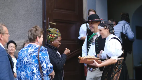 Local congregants welcoming Lutherans from around the globe joining Sunday worship at the Lutheran church in Bystřice, Czech Republic, with bread and salt. Photo: LWF/Marie Renaux Local congregants welcoming Lutherans from around the globe joining Sunday worship at the Lutheran church in Bystřice, Czech Republic, with bread and salt. Photo: LWF/Marie Renaux